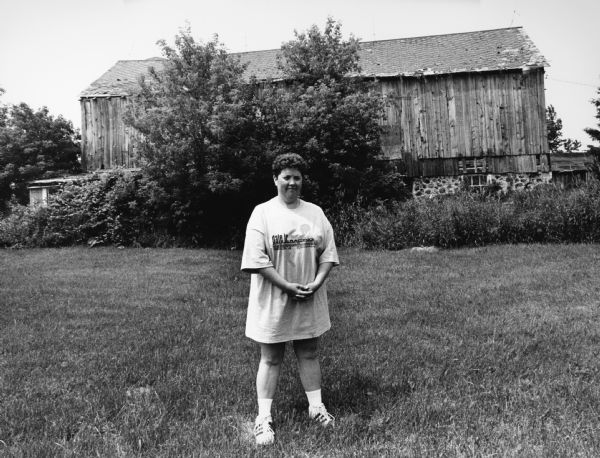 Helen Hayes poses in front of the barn on her farm at N8207 West Bend Rd (Section 24). This is the former Ted Gundrum farm.