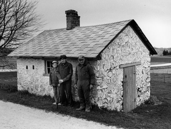 This old smokehouse still stands on the Vernon Beck farm. The Becks will celebrate 65 years of marriage on May 24, 2004.