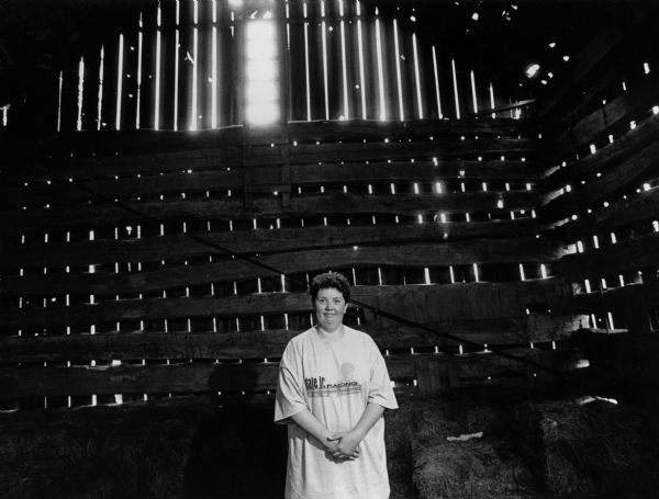 Helen Hayes poses in the barn at her farm.