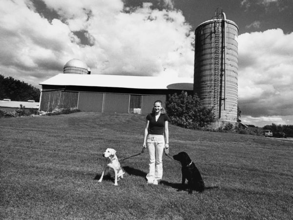 Angie Steckbauer poses with her pets, Callie and Drake, at N8184 Hwy P (Section 22).