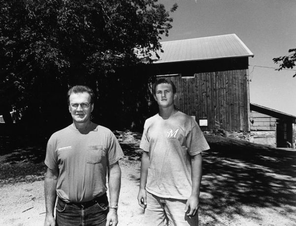 The Boddens purchased the farm from Pete and Helen Bodden in 1978.  Pete last milked in 1968. Eugene is shown with his son, Nathan.