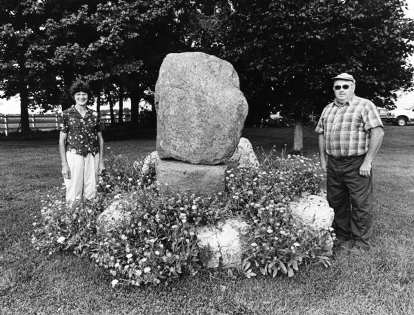 Having encountered some huge stones in their fields, Richard and Dorothy decided to make some into a centerpiece on their lawn. Richard estimates the top stone to weigh 3,000 pounds.