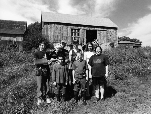This barn is on the Gordon and Tammy Giese property at N7452 Hwy AY (Section 32). They are pictured with their children: Rebeckah, Jonathan Benjamin, Paul, Alex, and Daniel.