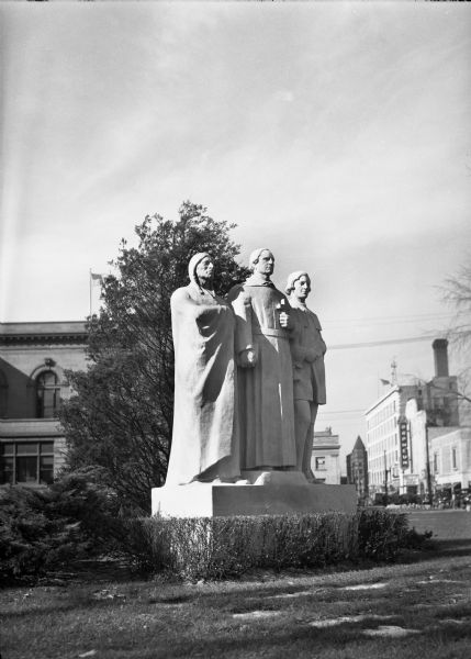 "The Spirit of the Northwest," a sculpture by Sidney Bedore which features a missionary, an explorer, and a Native American.