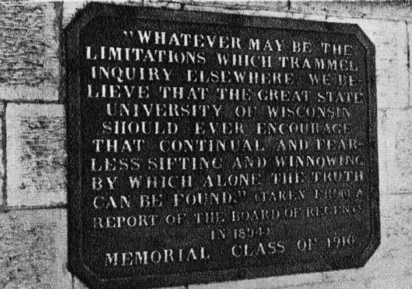 A view of a plaque, located near the entrance to the "main building" on the University of Wisconsin-Madison campus.