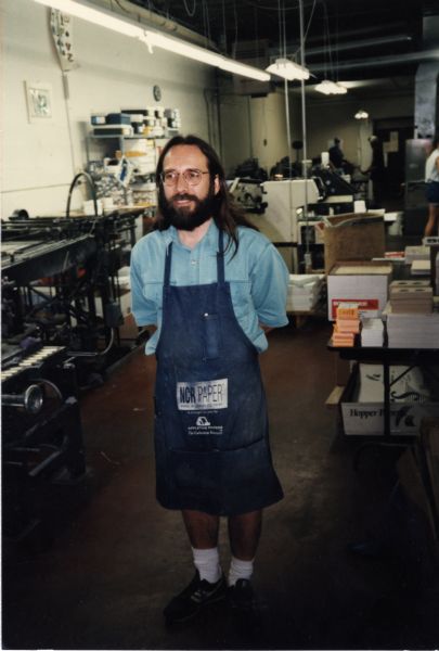 John Maas, a printer at RC Printing, poses at work.