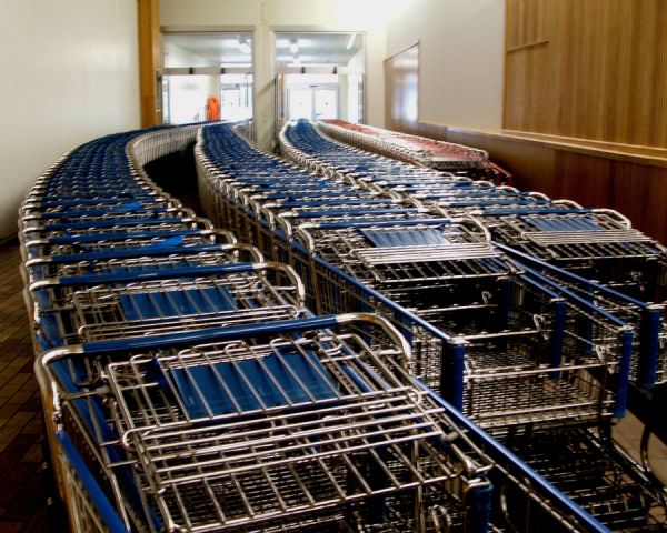 A row of carts at Woodman's Grocery entryway.