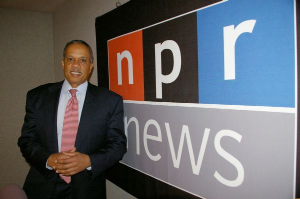 News analyst Juan Williams in front of NPR news sign.