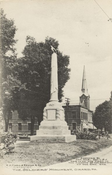 Erected in Girard, Pennsylvania, in 1875 to the memory of soldiers in the Civil War. Likeness of "Old Abe" appears on the top of the monument. On the bottom is a description of how the monument was erected and why it was built. Caption reads: "Soldiers' Monument, Girard, PA."