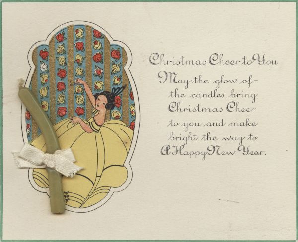 Holiday card with an image of a lady wearing a yellow, floor length gown and black comb in her hair. She appears inside of a geometric shape. The background is vertically striped wallpaper with flowers. An actual candle is tied to the card on the left side with a cream colored ribbon. On the right is the text "Christmas Cheer to You. May the glow of the candles bring Christmas Cheer to you and make bright the way to A Happy New Year." Printed by lithography.