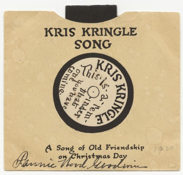 A holiday card that looks like a miniature record in an album jacket. The jacket has text that reads: "Kris Kringle Song, A Song of Old Friendship on Christmas Day." On the record it reads: "Kris Kringle" and handwritten is, "This is a reminder that you have one coming." The inside of the record, when pulled out and opened, (not shown) reads: "Kris Kringle Song, Dec•25, Put on a wooden needle and softly play, A song of old friendship on Christmas Day: Your Victrola wind, ere the tune's played through, Lest our friendship record should play out too." Letterpress, black ink on cream paper and die cut.