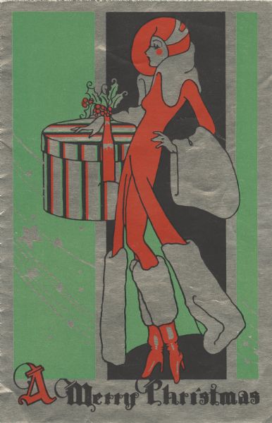 Holiday card with a drawing of a stylish woman dressed in a fur-trimmed coat and boots, and red hat, carrying a large striped round box with holly on the handle. The text at the bottom reads: "A Merry Christmas." Letterpress, black, red and green ink on metallic silver paper.