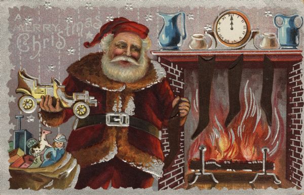Holiday postcard with Santa Claus to the left of a blazing brick fireplace with three stockings hanging from the mantle. He is holding a stocking in his left hand and a toy car in the other. Dishes and a clock are sitting on the mantle. He has a sack full of toys. Santa is wearing his traditional red suit. The text "A Merry Christmas" is in the upper left corner. Chromolithograph and metallic silver ink. The image is embossed.