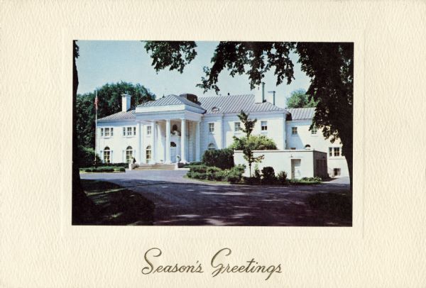 Holiday card from Warren P. Knowles, Governor of Wisconsin, 1965-1971. The front of the card has a color image of the Wisconsin governor's mansion glued onto a textured and embossed paper card with "Season's Greetings" below it. The inside has a greeting from the governor that reads: "Sincerest Greetings for a Joyous Christmas and the Happiest of New Years," with his signature below. Also inside is a short history of the Executive Residence on a sheet of tissue paper. Offset lithography and embossed.
