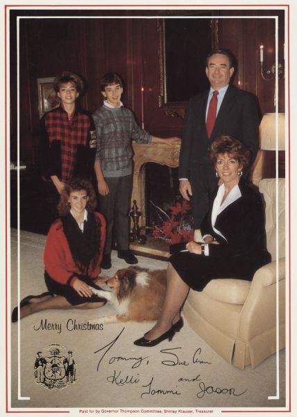 Photographic holiday card from Tommy Thompson and family, governor of Wisconsin, 1987-2001. The card is a color image of Mr. Thompson, his wife, daughters, son, and dog. It reads in the left corner: "Merry Christmas," with the Wisconsin seal foil stamped underneath it. The bottom of the card is signed by all the members of the family. Offset lithography and foil stamped.