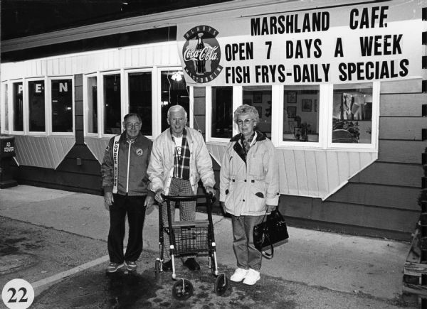 "The day before deer hunting begins, we visit the Marshland Cafe in Horicon, Wisconsin." From left to right; Rudy Heinecke, Ralph Widmer, and Shirley Widmer.