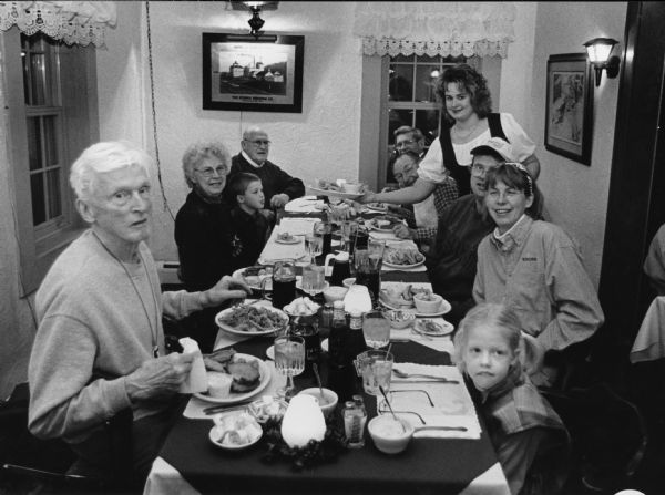 "Vicki, waits on our group at the Little Red Inn in St. Lawrence." Pictured (Clockwise around the table); Ralph Widmer, Shirley Widmer, Parker Hren, John Bodden, Ralph "Buddy" Ruecker, Rudy Heinecke, Vicki, Larry Hren, Kay Hren, and Carly Hren.