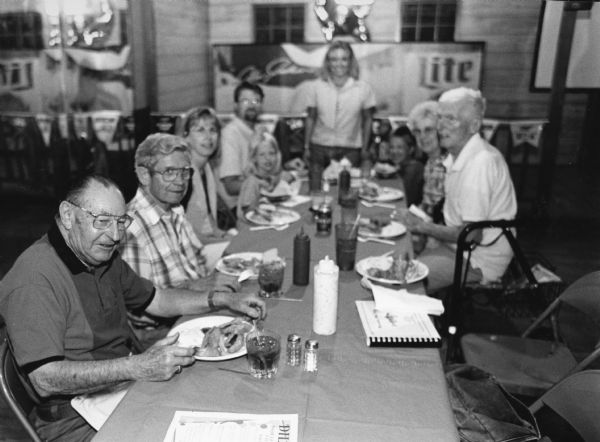 "Jen Hillbert serves us food at Ledgeview Lanes. Perch are $7.95. We vote them 4.3 Stars." Left to right; Rudy Heinecke, Ralph "Buddy" Ruecker, Kay Hren, Carly Hren, Larry Hren, Jen Hillbert, Parker Hren, Shirley Widmer, and Ralph Widmer.