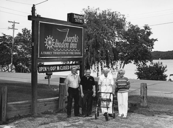 "Barth's Linden Inn is located on the West shore of Big Cedar Lake, between Slinger and West Bend on Hwy. 144." From left to right; Ralph "Buddy" Ruecker, Rudy Heinecke, Ralph Widmer, and Shirley Widmer.