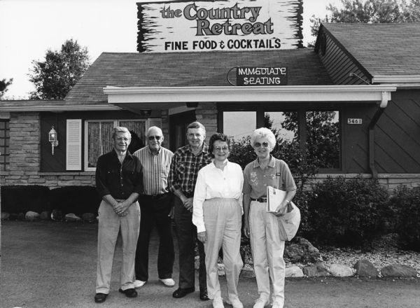 "The Country Retreat is midway between Hartford and Slinger on Hwy. 60. We are joined by Bob & Jean White of Williamston, MI. Bob and Jim were friends in the army during WWII." From left to right; Ralph "Buddy" Ruecker, John Bodden, Bob White, Jean White, and Shirley Widmer.
