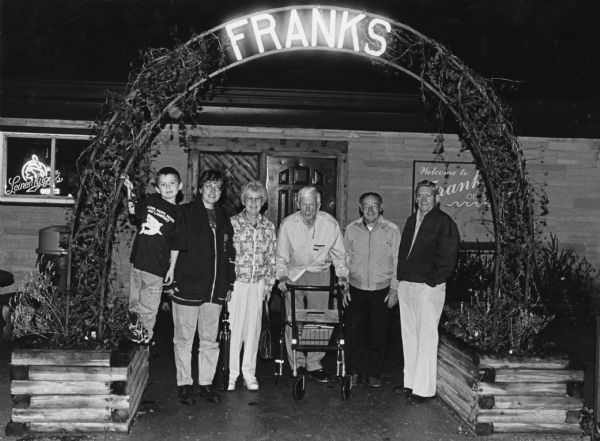 "Brenda Willz and her son Logan join us at Frank's On The Lake in Dundee." From left to right; Brenda Wilz, Logan, Shirley Widmer, Ralph Widmer, Rudy Heinecke, and Ralph "Buddy" Ruecker.