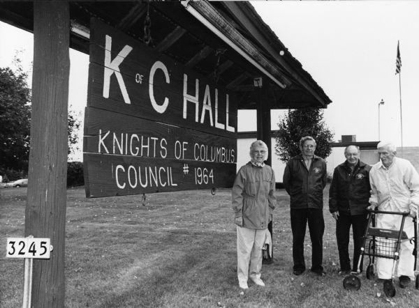 "The Knights of Columbus Hall is at 3245 Lighthouse Lane in West Bend, WI." From left to right; Shirley Widmer, Ralph "Buddy" Ruecker, Rudy Heinecke, and Ralph Widmer.