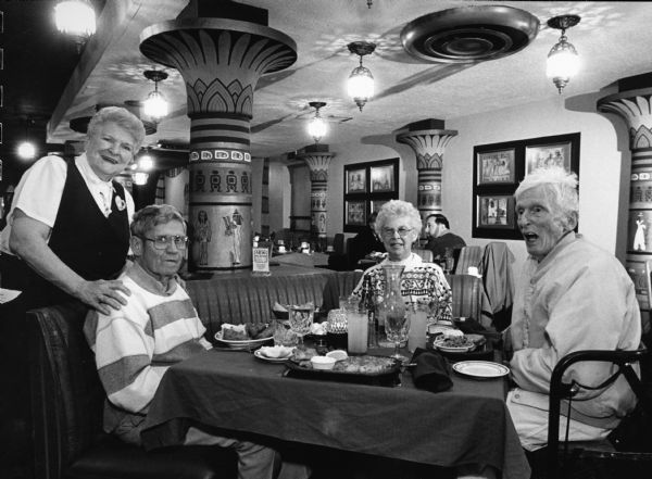 "Our waitress at the Pyramid was Patricia 'George' Butch. She explained that 28 years ago, when she applied for the job, there was already an employee named Pat. She said call me 'George,' a nickname she uses to this day." From left to right; Patricia 'George' Butch, Ralph "Buddy" Ruecker, Shirley Widmer, and Ralph Widmer.