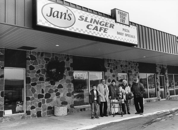"Parker & Carly Hren, join us at Jan's Slinger Cafe , in Slinger WI." From left to right; Parker Hren, Ralph "Buddy" Ruecker, Ralph Widmer, Carly Hren, Shirley Widmer, and John Bodden.