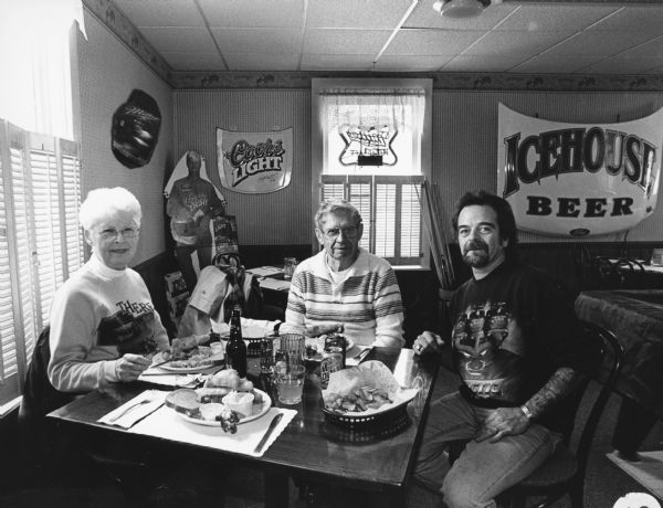 "Mike Wagner, the tattooed owner of Schuyler Street Pub, brought us their delicious food. Mike told us that he is a devoted biker."