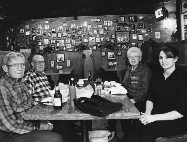 "Connie waited on us at Lucky's in Fond du Lac." From left to right; Ralph "Buddy" Ruecker, John Bodden, Shirley Widmer, and Connie.