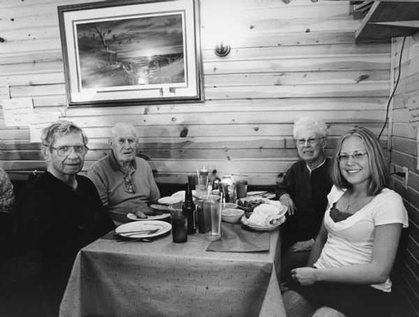 "Sarah was our waitress when we visited Good Old Days on Puckaway Lake near Montello." From left to right; Ralph "Buddy" Ruecker, John Bodden, Shirley Widmer, and the waitress.