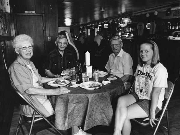 "Valerie was our waitress at D'N'D's Country Tap in Dundee." From left to right; Shirley Widmer, unknown, Ralph "Buddy" Ruecker, and the waitress.