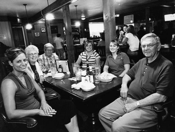 "Christine (left) was our waitress at Bilda's Friess Lake Pub, Hubertus." Pictured from left to right; Christine, Shirley Widmer, Ralph "Buddy" Ruecker, Kim Diorio, Alesha Hill, and Carl Bernhard.