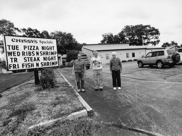 We visit Chissy's Pub And Grille, 501 North Mill Street, (just odd Highway 57) Waldo." From left to right, John P. Widmer, Ralph "Buddy" Ruecker, and Shirley Widmer.