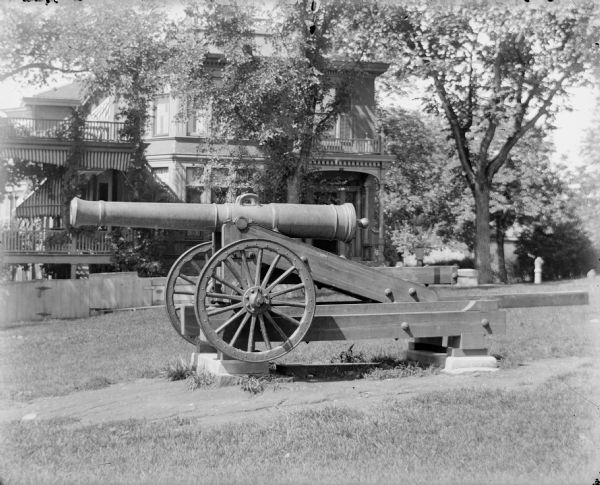 A Spanish-American War cannon sits on the lawn of the Lucius Fairchild mansion, located on West Wilson Street. The cannon was later moved to Camp Randall on the University of Wisconsin-Madison campus.