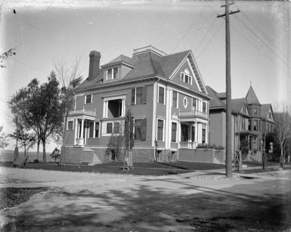 The A. D. Frederickson house at 504 E. Gorham Street. A two- and one-half story house with both Queen Anne and Colonial Revival features. It is located on one of Madison's lakes and features a widow's walk.
