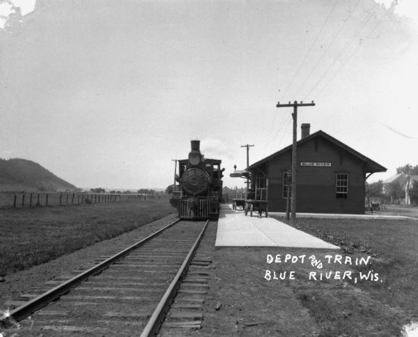 Train stopped at Blue River Depot.