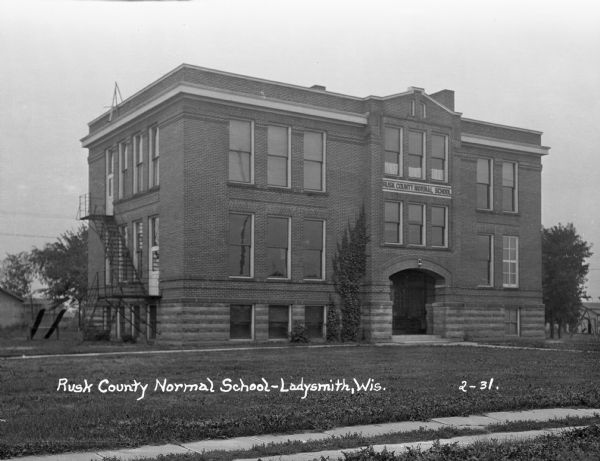 Exterior of the two-story Rusk County Normal School.