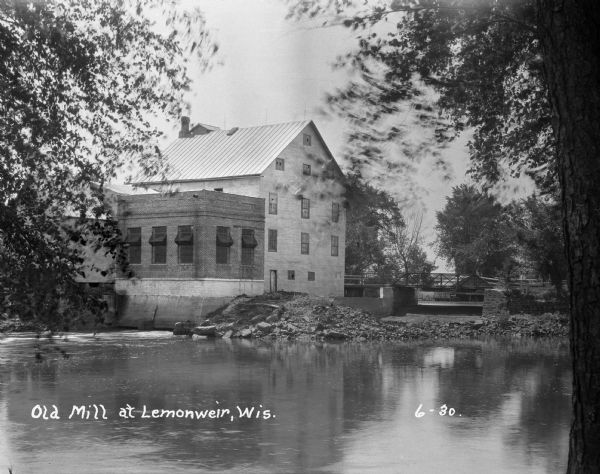The rear of the Lemonweir River flour mill and its water reservoir.