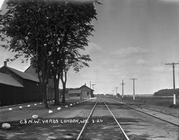 View down railroad tracks towards the London train depot.
