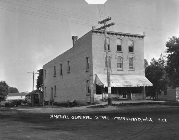 View across street of exterior of the Smedal general merchandise store.