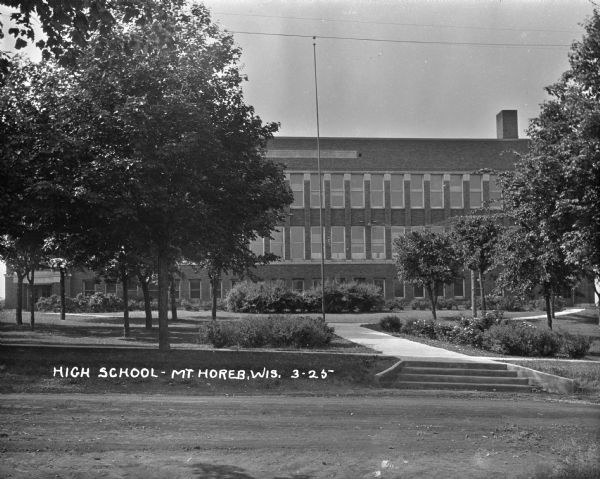 View across road of the exterior of the Mount Horeb Public School, built in 1918.