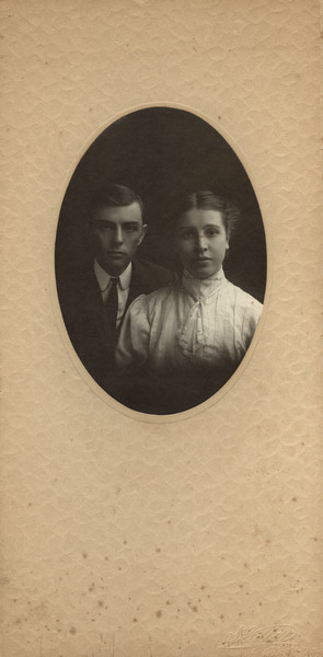 Oval matted quarter-length portrait of Sherwin and Emma Gillett the year they married.