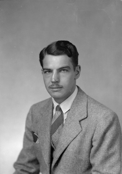 Waist-up studio portrait of Lorin Gillett at approximately 21 years of age.