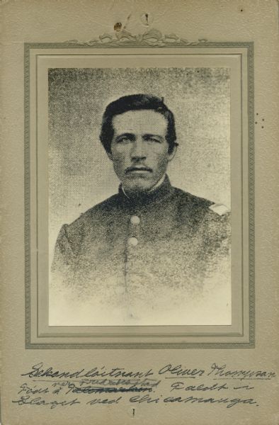 Head and shoulders studio portrait of Oliver Thompson, a second lieutenant in Company A, 15th Wisconsin Infantry, in uniform. The following information was obtained from the Regimental and Descriptive Rolls, Volume 20 and 7: He resided in Chicago, Illinois. On November 15, 1861, he commissioned as a second lieutenant and mustered into service on December 20, 1862, in Madison, Wisconsin at the age of 25. In May 1862, he was arrested and awaiting sentence. On September 20, 1863, he was killed during the battle at Chickamauga, Georgia.