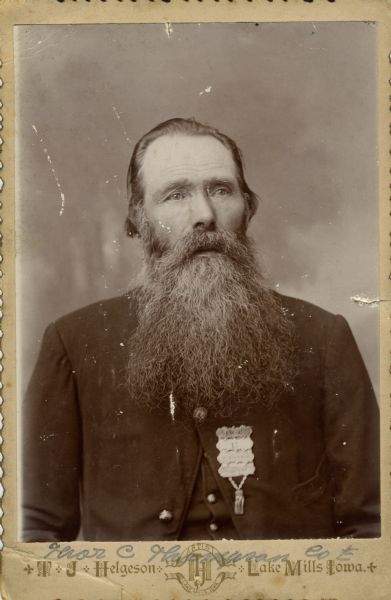 Quarter-length cabinet card portrait of Thor C. Thompson, [name in the roster is Thomas C. Thompson] a sergeant in Company E, 15th Wisconsin Infantry. The following information was obtained from the Regimental and Descriptive Rolls, Volume 20: He resided in Preston, Minnesota. On November 25, 1861, he enlisted in La Crosse, Wisconsin and on December 20, 1861, he was mustered into service in Madison, Wisconsin at the age of 28. He enlisted with the rank of sergeant and discharged due to disability on March 23, 1863 in Nashville, Tennessee.

Based on the Civil War Pension Index, Thomas C. Thompson also used the name Thor C. Thompson and Thor Thorson Kingland.