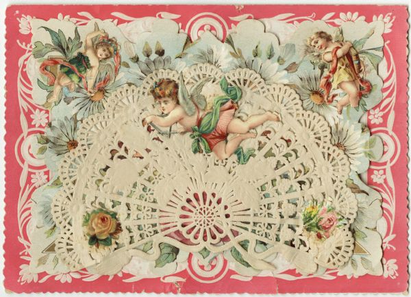 Valentine's Day card with three layers. The bottom layer is a pink and white card with embossed floral designs. The middle layer (not visible) is a country home surrounded by flowers, with several children on the right, and two die cut cherubs attached to the upper corners. The top layer is a fan-shaped piece of paper lace, with one die cut cherub playing a musical triangle, and two flowers attached to it. All three layers are connected using folded paper "springs" to created a three dimensional piece. Chromolithograph, embossed and die cut.