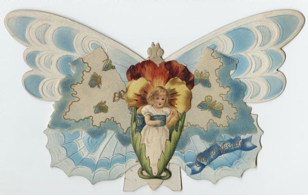 Valentine's Day card with three layers. The bottom layer is a large blue and white butterfly, and in the lower right is glued a banner with the text: "Cupid's Message." The middle layer has butterflies in blue and gold printed on heavy parchment paper. The top layer is a girl wearing a white dress with a blue sash, standing between two leaves. A large pansy flower is behind her. There is a paper "spring" between the top and bottom layers creating a three dimensional look. There is a paper easel on the back so the Valentine can stand vertically. Chromolithograph, embossed and die cut.