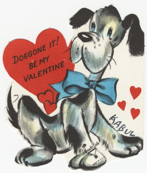 Child's Valentine's Day card with a dog wearing a blue bow around his neck. A heart in the upper left corner reads "Doggone it! Be My Valentine." These valentines could be purchased several to a package, and children often exchanged them at school. Offset lithography and die cut.