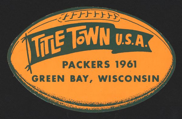 A bright orange sticker in the shape of a football with the words "Title Town U.S.A." written on a pennant and the words "Packers 1961, Green Bay, Wisconsin" written under it.